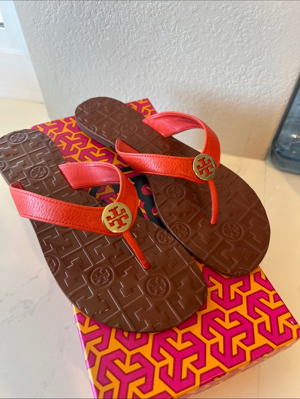 Tory Burch women’s  Orange Leather Logo Thong Sandals with Brown Footbed